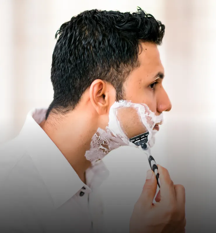 EMAC premium shaving gel in use – Indian man shaving smoothly